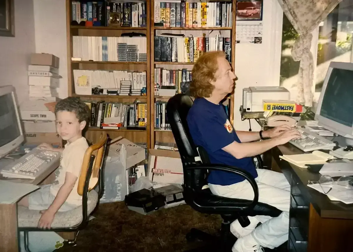 My dad and I at our computers in the 90s